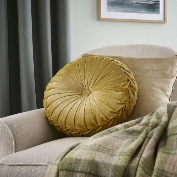 Rosanna Round Polyester Cushion, Laura Ashley, Classic Style. Central button, in amber tone. 35cm in diameter.