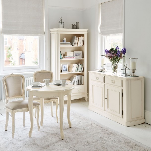 Unique bookcase, with a full drawer and 3 shelves (1 fixed and 2 adjustable). Classic design. Ivory painted finish with patina.