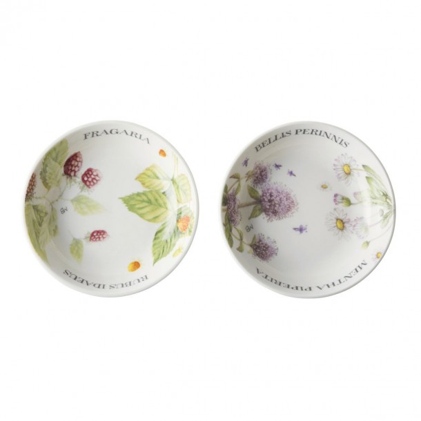 Set de 2 platitos de porcelana fina, presentados en caja de regalo, estampados con decoración floral de diseño.