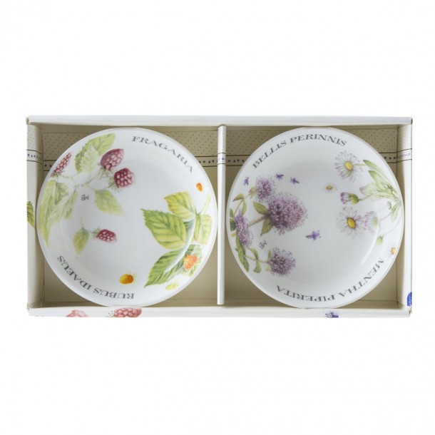 Set de 2 platitos de porcelana fina, presentados en caja de regalo, estampados con decoración floral de diseño.