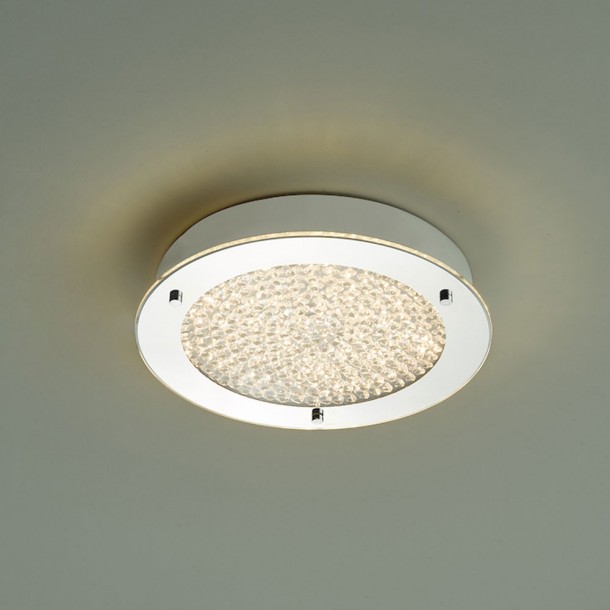 Lámpara Peta acabada en cromo pulido y cristal texturizado. Perfecta para el baño con IP44. Incluye bombilla LED blanca cálida.