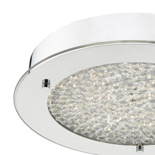 Lámpara Peta acabada en cromo pulido y cristal texturizado. Perfecta para el baño con IP44. Incluye bombilla LED blanca cálida.