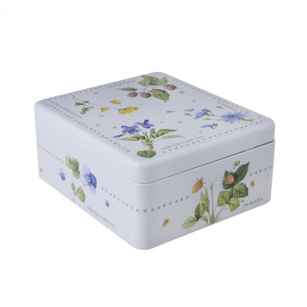 Caja de metal para bolsitas de té, estampada con decoración floral de diseño.
