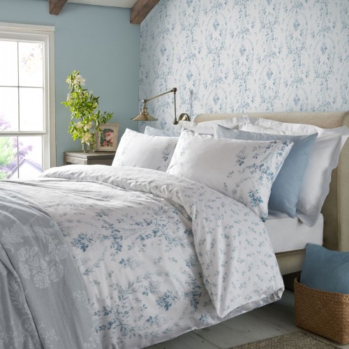 Set of blue flowers on a white background, and reverse of small flowers, by Laura Ashley.