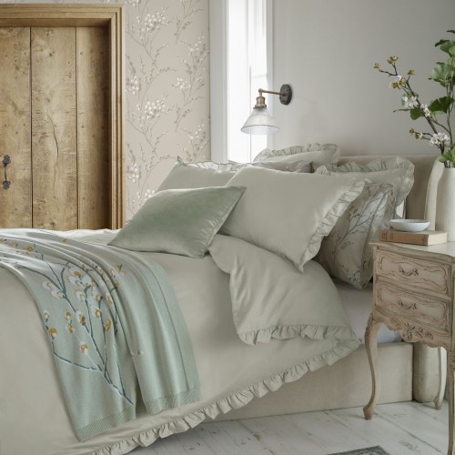 Plain, light gray bed set with curly ruffle, by Laura Ashley. Duvet cover and 1 or 2 pillowcases.