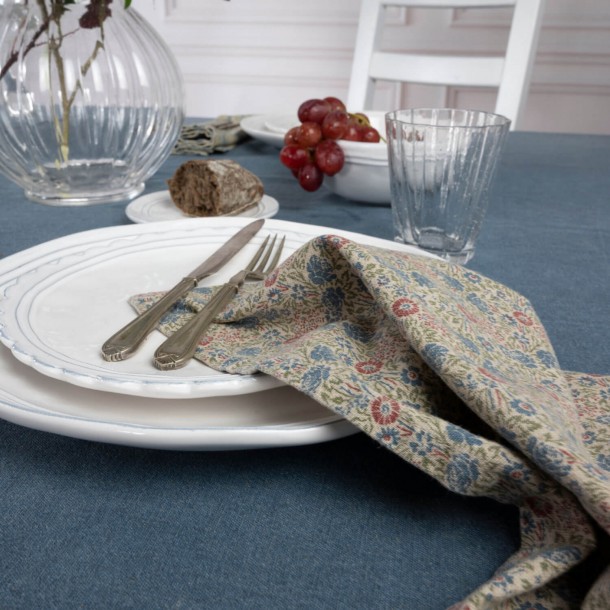 Blue tablecloth with flowers: 40% Cotton, 30% Linen, 30% Polyester. Vintage Wild Clematis Collection, Laura Ashley.