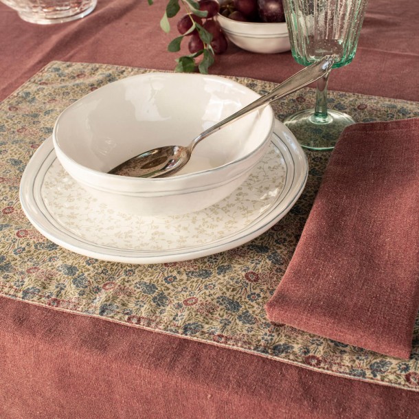 Reversible red placemats in red and floral print, Laura Ashley. Complete the Kitchen Linen textile collection.
