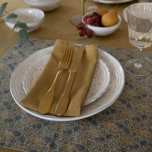 Manteles individuales reversibles mostaza, con estampado floral, Laura Ashley. Completa la colección textil Kitchen Linen.