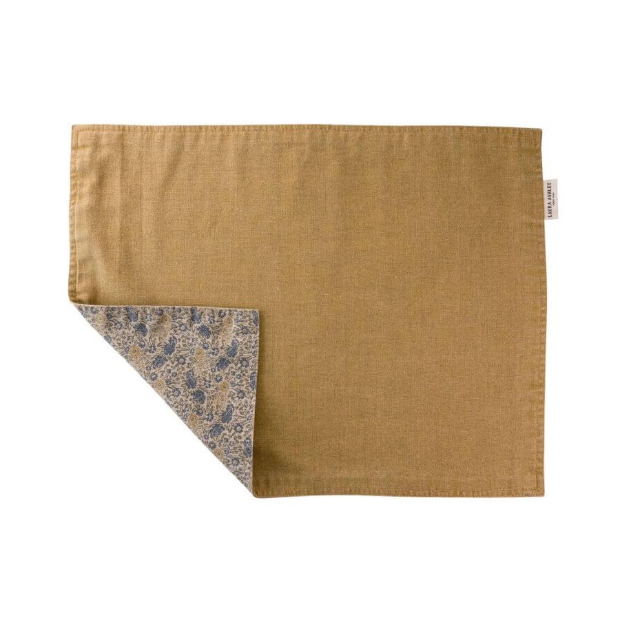 Manteles individuales reversibles mostaza, con estampado floral, Laura Ashley. Completa la colección textil Kitchen Linen.