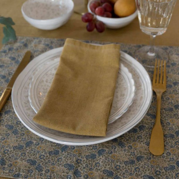 Daniela mustard napkin in cotton, linen and polyester, by Laura Ashley. Measures 45cm x 45cm