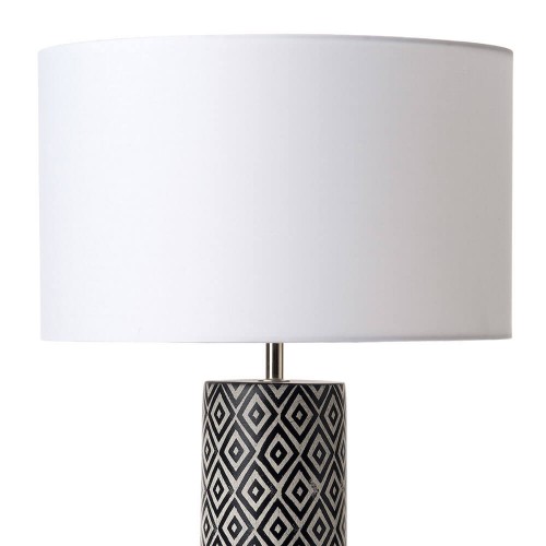 Ego, base de lámpara cerámica estampada con diseño geométrico en blanco y negro.