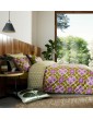 Orla Kiely bed set. Inspired by classic Delft floral tiles, Mauve, Violet and Moss Green. Reversible.